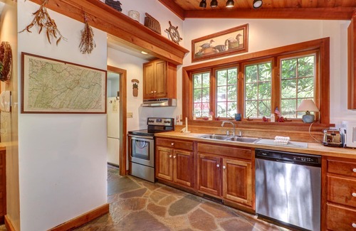 Blakeslee House | Dog-friendly Lakefront Log Home on a Quiet Cove with Front Deck & Private Dock