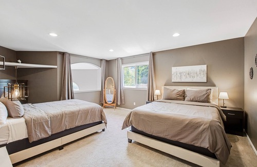 Big Lake House | Dog-friendly retreat with a large deck, hot tub, grill, firepit, and game room