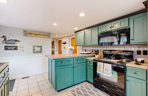 Gilmanton House | Dog-friendly retreat near the tranquil pond shore with spacious deck and dock