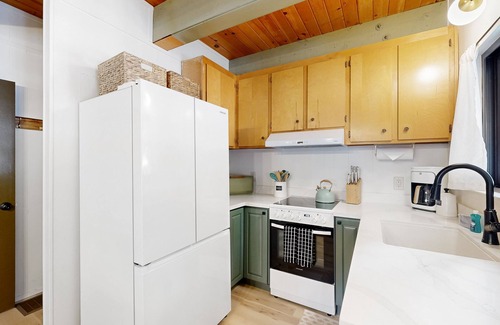 Arnold House | Dog-friendly wilderness retreat with pool, grill, circular fireplace, & W/D