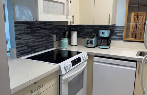 Dam Neck Apartment | Dolphin Beach condo with indoor pool, ocean views, steps to the beach