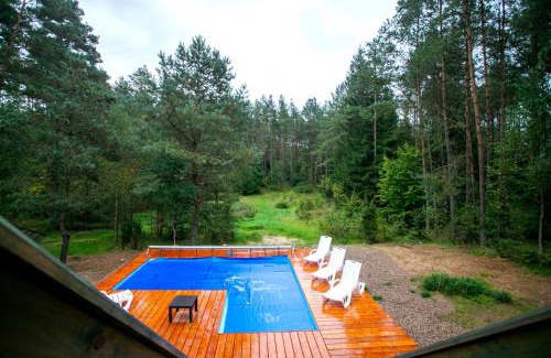Sulecki Borek House | Domek całoroczny RYSIÓWKA na Kaszubach z basenem banią sauną bilardem na wyłączność - Ostrowite Leśna Dolina
