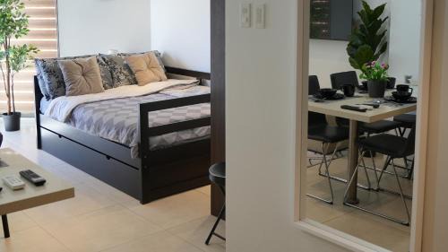 Maribago Apartment | Dominiks quite and Elegant Studio Ocean View Pool at Tambuli Resort High Floor