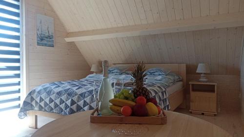 Mielno House | Domki Anielski Zakątek J&R nad Bałtykiem DELUX z balią ogrodową z jacuzzi i klimatyzacją