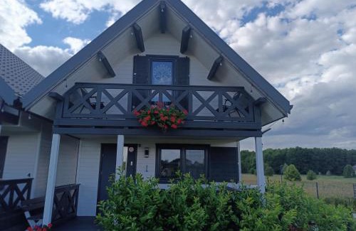 Mielno House | Domki Anielski Zakątek J&R nad Bałtykiem DELUX z balią ogrodową z jacuzzi i klimatyzacją
