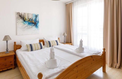 Morbisch am See Cottage | Doppelzimmer mit Balkon und Kleinem Bad - Pension Laubenhof