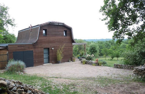 Betaille House | Dordogne Valley Lot timber-frame house set in greenery.