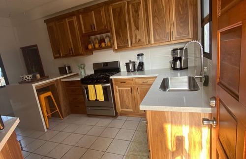 Dangriga Apartment | Downtown Dangriga! Style and comfort with a pool. Maya Mountains and sea views.