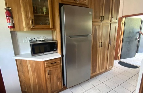 Dangriga Apartment | Downtown Dangriga! Style and comfort with a pool. Maya Mountains and sea views.