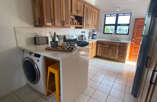 Dangriga Apartment | Downtown Dangriga! Style and comfort with a pool. Maya Mountains and sea views.