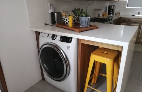 Dangriga Apartment | Downtown Dangriga! Style and comfort with a pool. Maya Mountains and sea views.