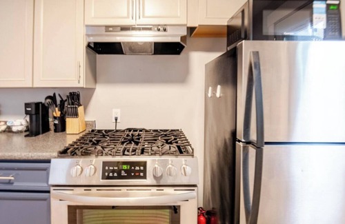 Columbus House | Downtown Hideaway in Cute Village Home. Off Street Parking + Washer & Dryer.