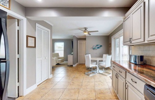 Indialantic House | Dreamy duplex with dog-friendly fenced yard, private outdoor living, AC, & W/D