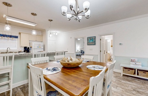 Central Myrtle Beach Condo | Dual-suite Magnolia Pointe condo with golf, pools, and screened patio