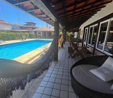 Manguinhos House | Duplex Geriba 250m da praia, rede futevôlei, sauna