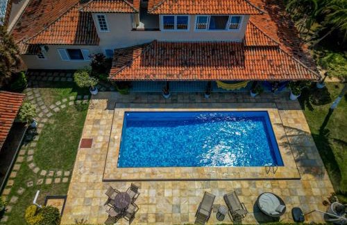 Manguinhos House | Duplex Geriba 250m da praia, rede futevôlei, sauna