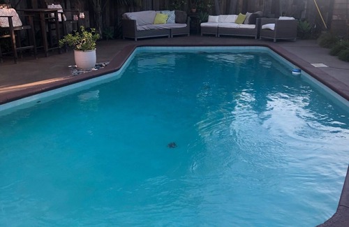 Old Towne House | Eclectic Private Home With Backyard Sanctuary And Pool In Seal Beach