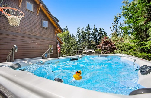 Bainbridge Island House | Eco home & studio with swim spa, Olympic views, home gym, & play structure