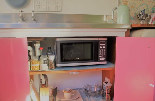 Porirua Cottage | EcoFarmstayNZ Retro-style cottage