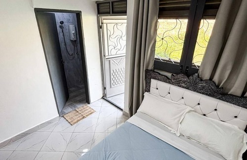 Entebbe Hotel | Economy Standard Room Entebbe with Nature View Balcony