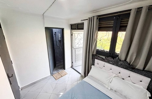 Entebbe Hotel | Economy Standard Room Entebbe with Nature View Balcony