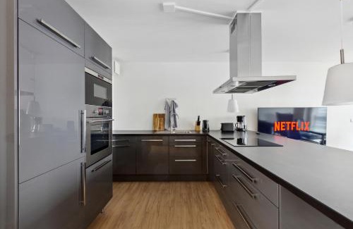 Suedwest Apartment | Eindrucksvolle Zwei-Zimmer-Wohnung mit Balkon und großer Küche