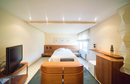 Olius Hotel | El Pi de Sant Just - Habitacions i Apartaments