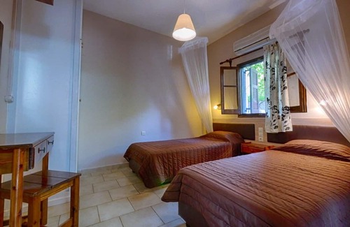 Agios Georgios Pagon Apartment | Eleana holiday apartment 6 EC - with sea view and direct beach location in Agios Georgios Pagi