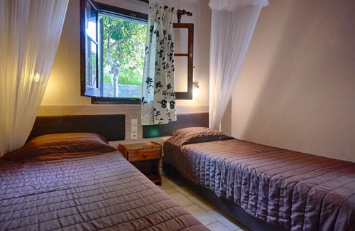Agios Georgios Pagon Apartment | Eleana holiday apartment 6 EC - with sea view and direct beach location in Agios Georgios Pagi