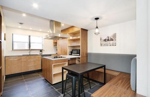Manhattan Apartment | Elegant 2BR Escape in Manhattan with WiFi & Parking
