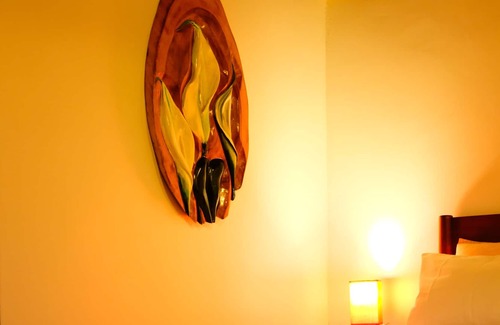 Puerto Quito Cabin | Elegant and beautifully crafted cabin with fine wood. Cozy by nature and birds.