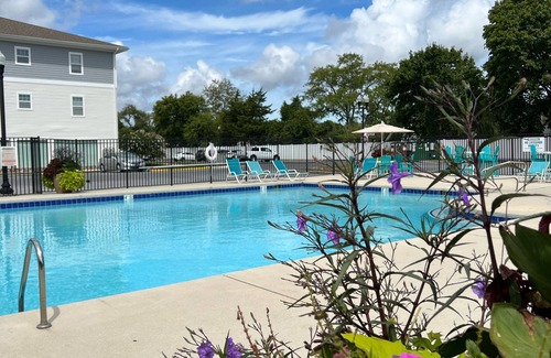 Lewes Condo | Elegant and cozy beach condo for your family vacation with pool and pond