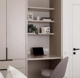 Chisinau Apartment | Elegant Apartment with Balcony, Dedicated Workspace, Coffee Station and 65" Smart TV - GrandStay md