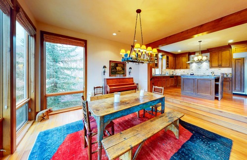 West End House | Elegant Aspen townhouse with an inviting deck, fireplace, and washer/dryer