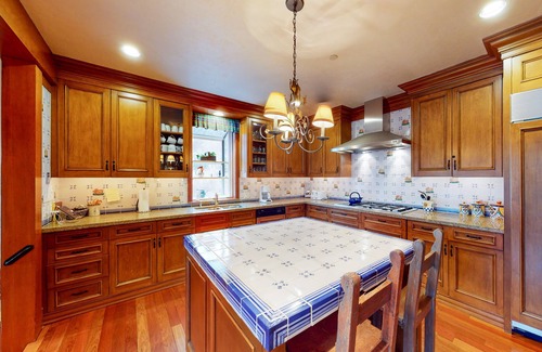 West End House | Elegant Aspen townhouse with an inviting deck, fireplace, and washer/dryer