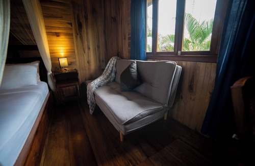 Puerto Quito Cabin | Elegant, bright and beautifully crafted cabin with fine wood. Double balcony.