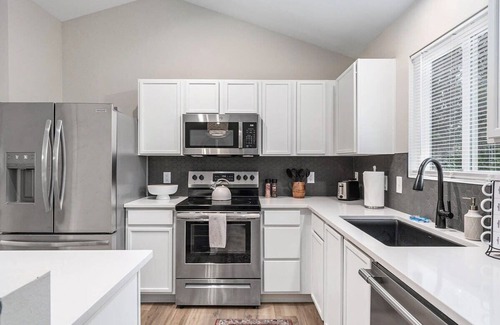 Millard House | Elegant Escape-Fenced Yard, BBQ & Cozy Fire Pit!