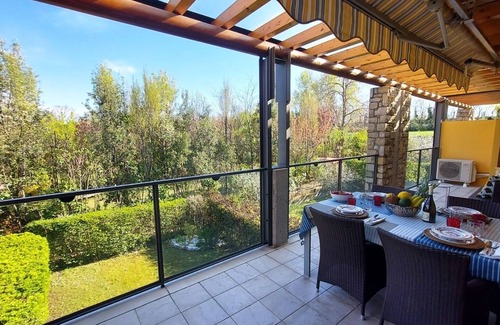 Desenzano del Garda Apartment | Elegant flat with large terrace in residence with swimming pool