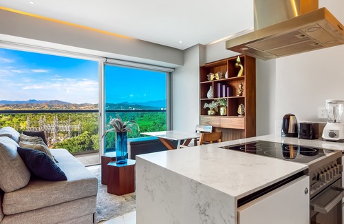 Flamingos Condo | Elegant resort condo with fantastic views, private balcony, and a great location