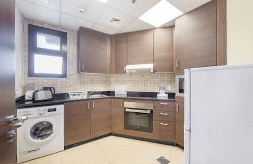 Jadaf Apartment | Elegant Studio with Canal View and Close to Metro