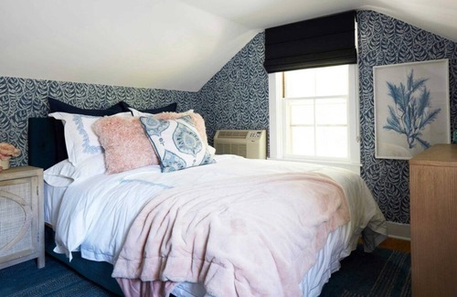 Lenox Bed & Breakfast | Elegant suite with a king bed, fireplace, and kitchenette.