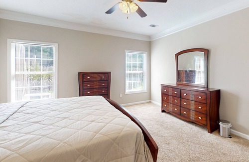 Gracewood House | Elegant townhome with fenced yard, community pool, & W/D - near golf