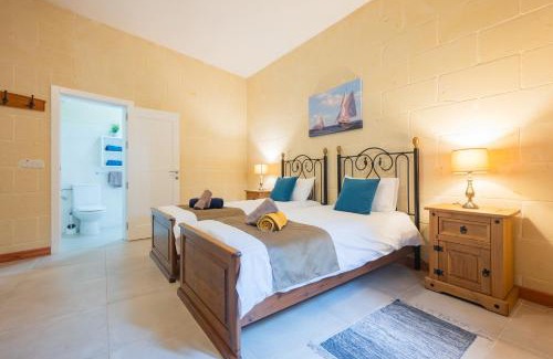 Xewkija Villa | Ellie Boo Farmhouse with Pool and Hot Tub and Games Room