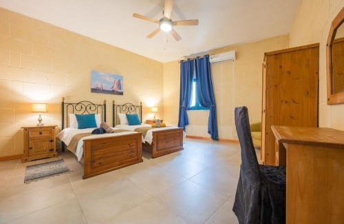 Xewkija Villa | Ellie Boo Farmhouse with Pool and Hot Tub and Games Room