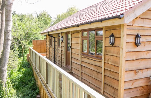 Old Cleeve Cottage | ELM LODGE, family friendly, with hot tub in Washford
