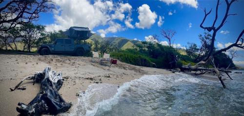 Paia Other | Embark on a journey through Maui with Aloha Glamp's jeep and rooftop tent allows you to discover diverse campgrounds, unveiling the island's beauty from unique perspectives each day