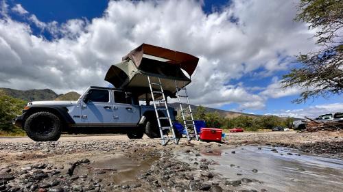 Paia Apartment | Embark on a journey through Maui with Aloha Glamp's jeep and rooftop tent allows you to discover diverse campgrounds, unveiling the island's beauty from unique perspectives each day