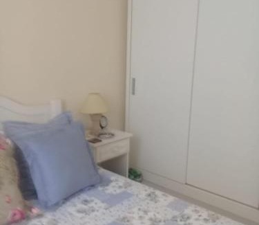 Jardim Vitoria Apartment | Encantador a 2 quadras da Enseada, com varanda e garagem