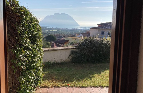 Porto San Paolo Apartment | ENCHANTING and FRESH PANORAMIC HOUSE with a view of the island of TAVOLARA