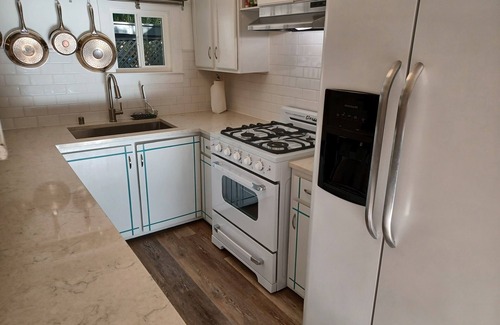 Burbank Gardens Neighborhood Association Cottage | Enchanting Bohemian Cottage for Two,enjoy the cool patio under ancient oaks